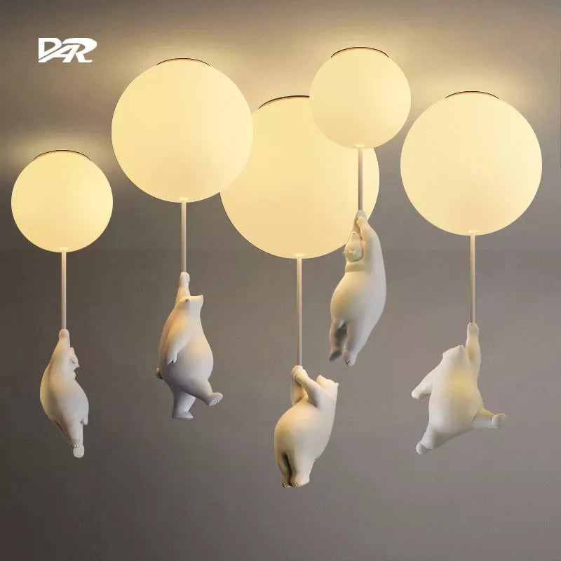 Suspension avec boule en verre et ours suspendu