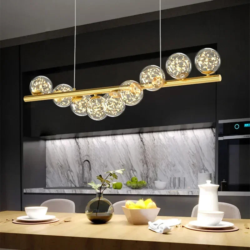 lustre nordique longue boule de verre or pour bar