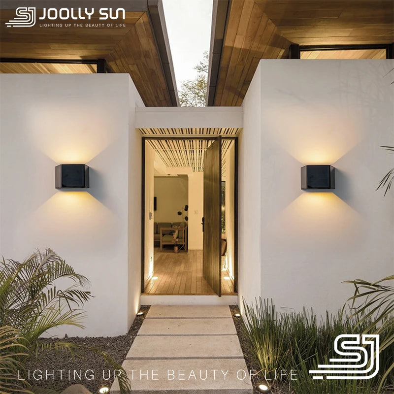 JoollySun Applique murale solaire sans fil lumière extérieure appliques murales LED pour Garage cour jardin haut et bas lampe alimentée par la lumière du soleil