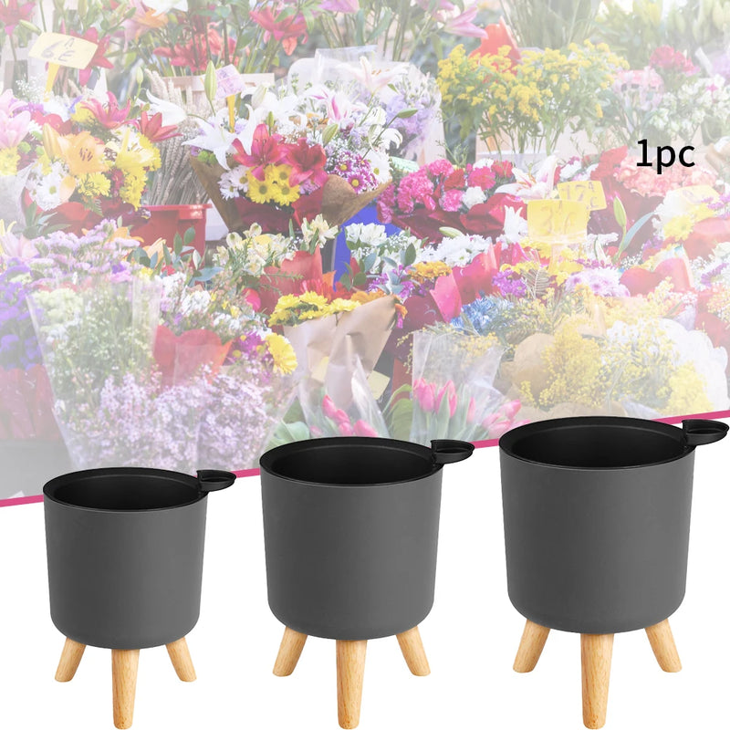 pot de fleurs rond sur pied avec arrosage automatique et drainage
