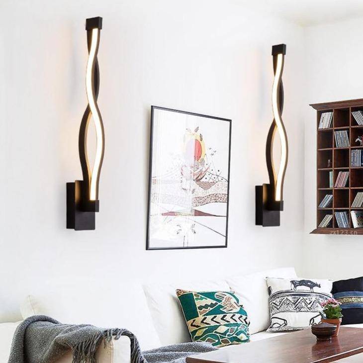 Applique murale design LED avec courbes en métal Sconce