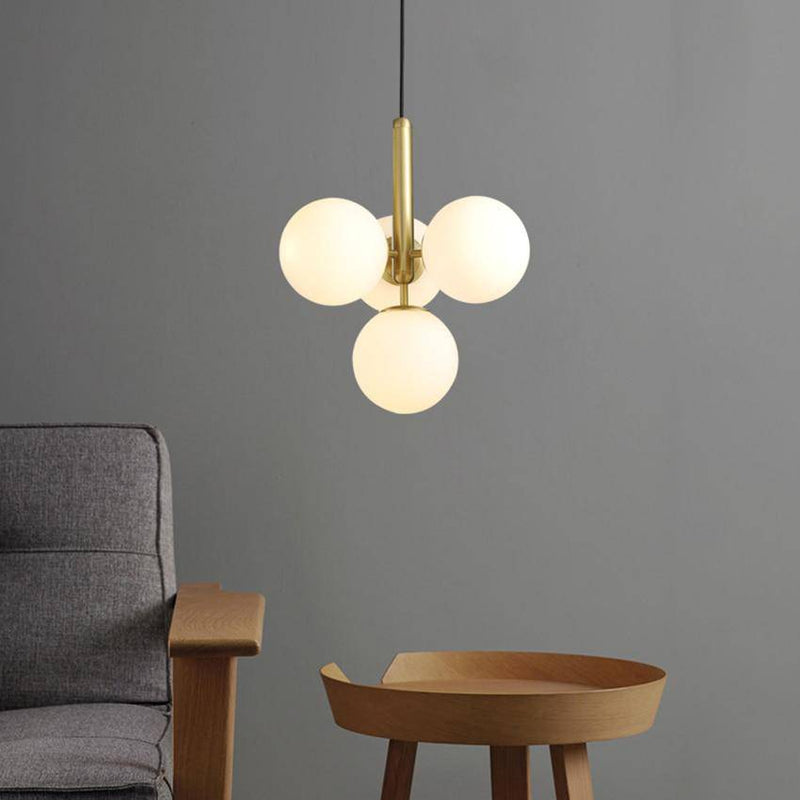 Suspension design LED avec cylindre doré et plusieurs boules en verres Fly