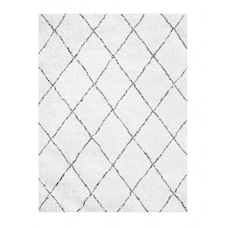 Tapis shaggy rectangle blanc à quadrillage noirs