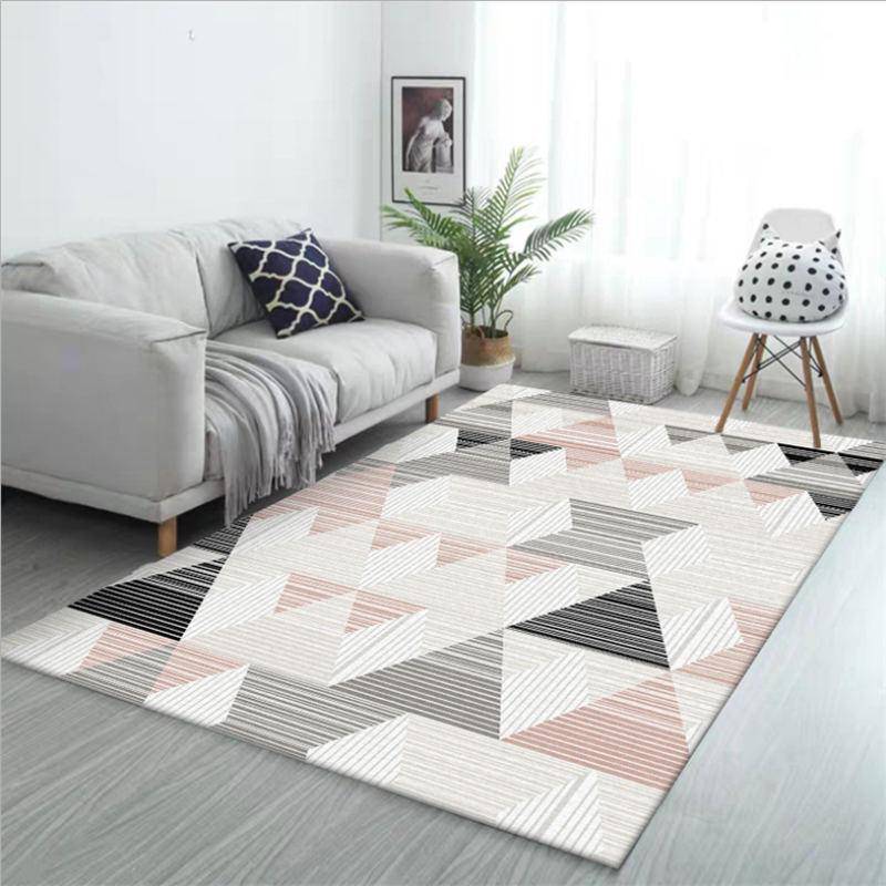 Tapis moderne aux formes géométriques roses et blanches