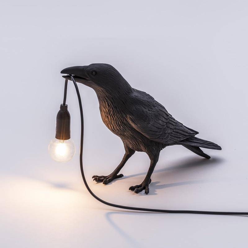 Applique murale LED avec oiseau qui tient une lampe dans son bec