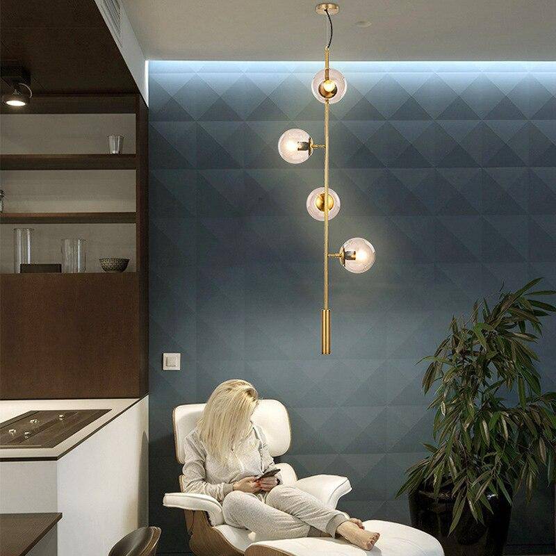 Lustre design LED en métal avec plusieurs boules en verre rétro