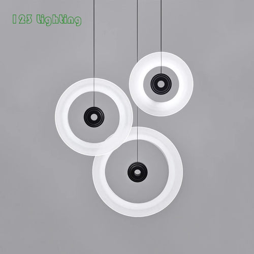 suspension ronde minimaliste en aluminium et verre pour espace contemporain