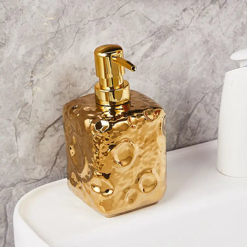 bouteille en céramique dorée décor lune pour lotion - vue 11 sur 11