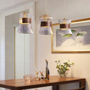 suspension moderne en verre avec détails en bois et cuivre