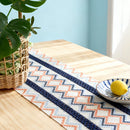 Chemin de table bohème motifs aztèques pompons beige