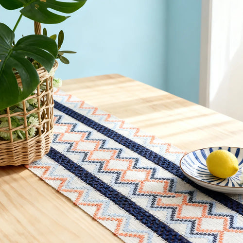 Chemin de table bohème motifs aztèques pompons beige