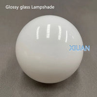 lampe boule de verre moderne avec base dissimulée pour divers usages