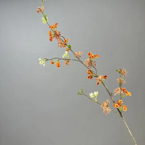 décoration de table en fleurs artificielles et saule neige