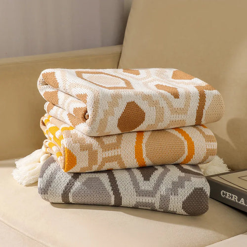 Plaid bohème géométrique à carreaux avec pompons salon