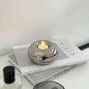 lustre moderne en céramique argentée avec bougies décoratives