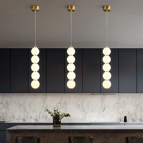 Suspension design à led boule verre or brillant