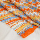 Plaid bohème tricoté à pompons pour canapé lit