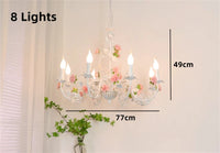 lustre en fer forgé avec décor de roses romantiques fleurs pastorales