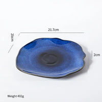 assiette plate ceramique japonaise forme coquille irreguliere