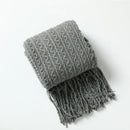plaid boheme ultra doux a carreaux avec pompons