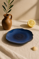 assiette plate ceramique japonaise forme coquille irreguliere