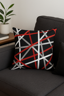housse de coussin noire et rouge motif géométrique élégant
