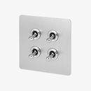 interrupteur-quadruple-4-voies-en-acier-gris-clair-bross-bords-arrondis-0.png