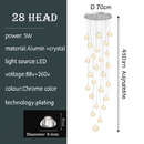 lustre en cristal design luxueux pour escalier colimaçon moderne