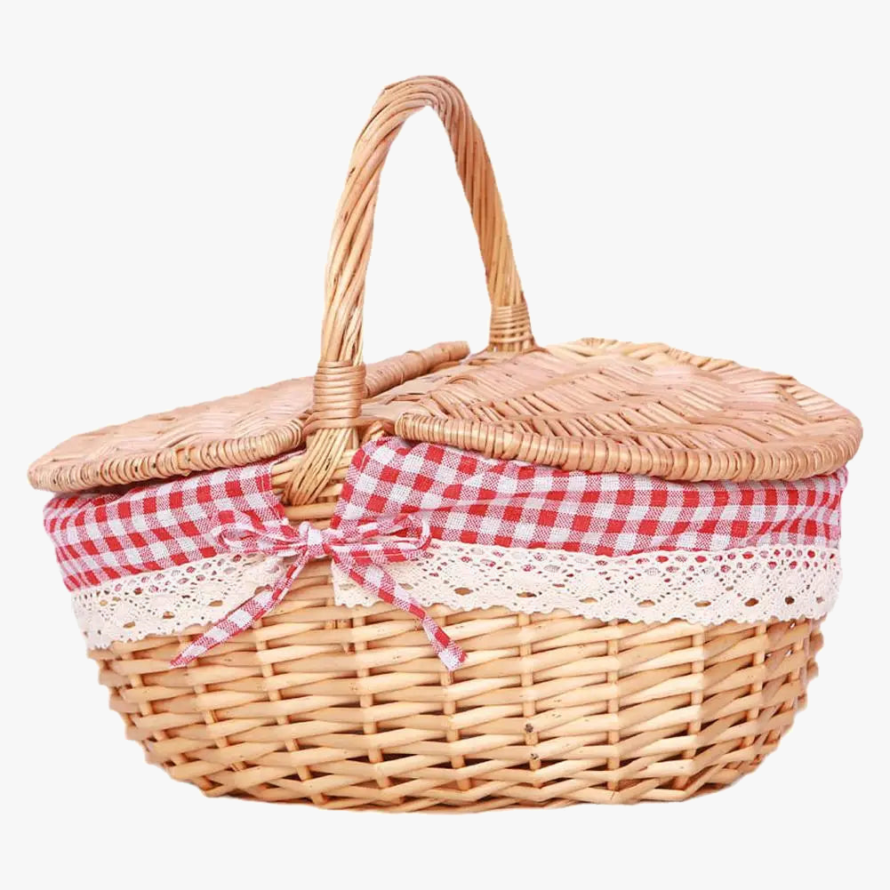 panier de pique-nique en osier avec poignée en main