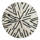 Tapis moderne rond aux formes géométriques noires et blanches Skin