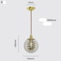 Suspension design en verre avec spirale dorée