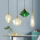 Suspension design à LED en verre et cage dorées