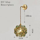 Applique murale design LED avec plusieurs trèfles en verre et métal