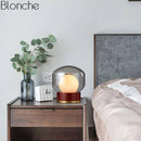 Lampe à poser design avec socle rétro doré et bois