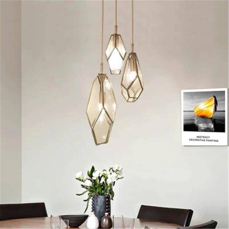 Suspension design dorée en métal et verre de plusieurs formes - vue 2 sur 9
