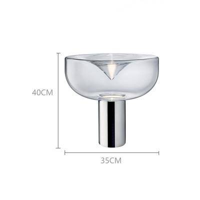 Lampe à poser design LED avec abat-jour arrondi et cylindre doré