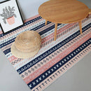 Tapis rectangle aux motifs géométriques roses et noirs style Keecy