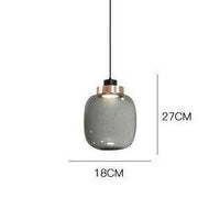 Suspension design LED avec sphère en verre et cercle cuivré