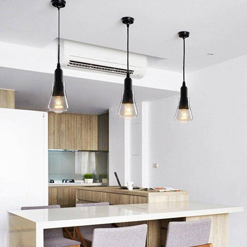 Suspension design LED noire avec abat-jour arrondie en verre