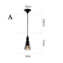 Suspension design LED noire avec abat-jour arrondie en verre