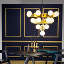 Lustre moderne pyramidale doré avec globes en verre luxury Ariana