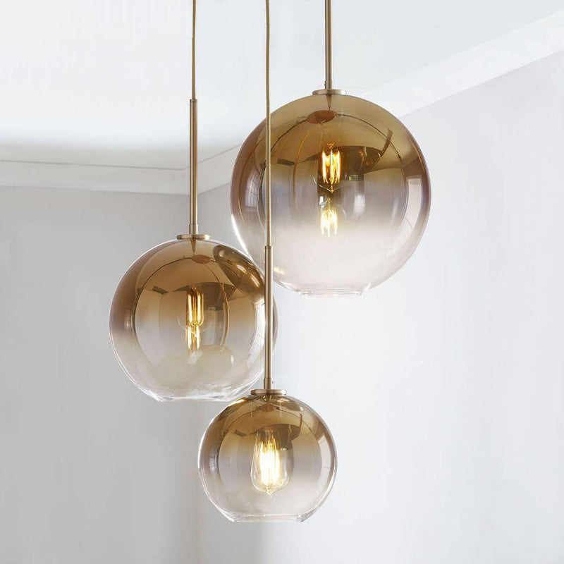 Suspension design boule en verre ambré Loft