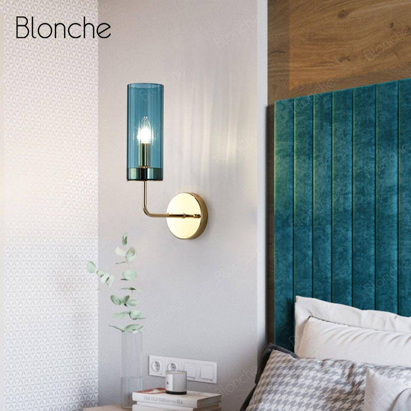 Applique murale design cylindrique en verre et base dorée