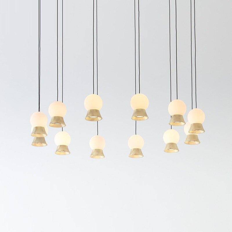 Suspension et lustre design à LED avec boule en verre et support dorée - vue 3 sur 14